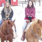 Nikki riding T and Gypsy and I in the snow.