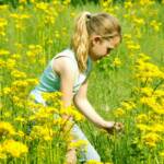 Sydney picking flowers.Tha is 